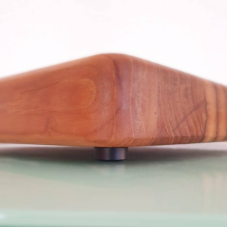 Cutting board foot under wooden board